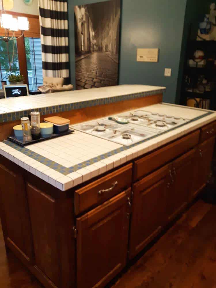 A breakfast bar in the kitchen before its paint makeover.