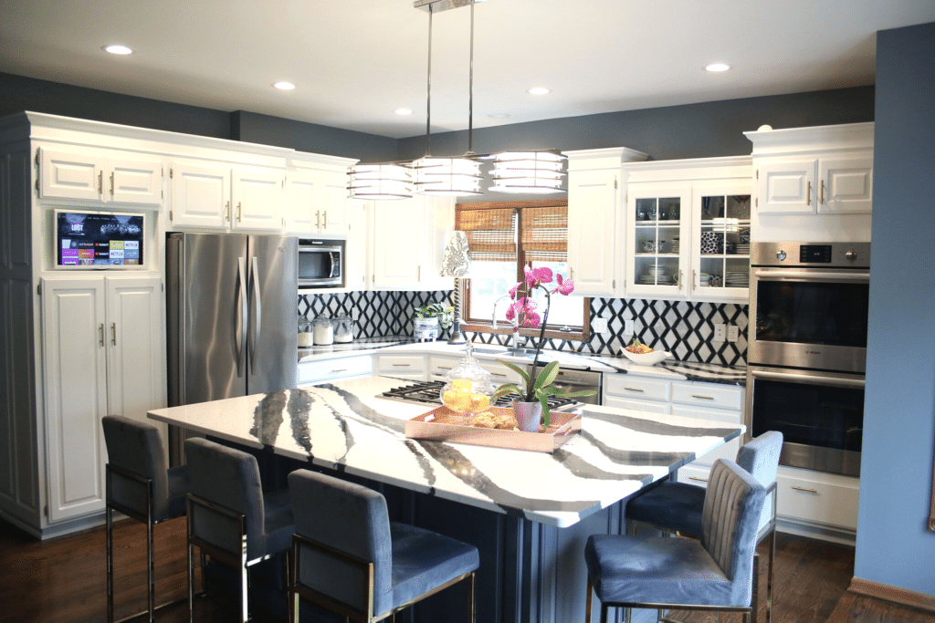 a remodeled black and white kitchen