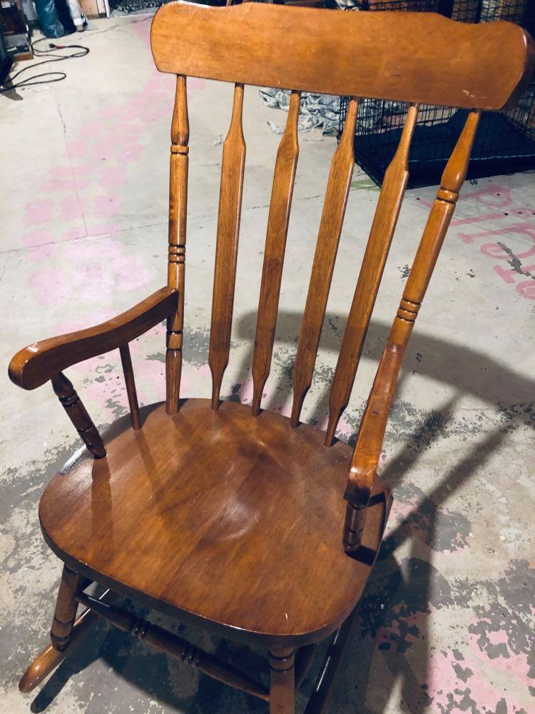 Brown wood rocking chair spray paint project.