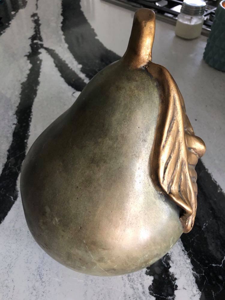 Turning a tuscan pear into a contemporary sculpture with gold leaf and spray paint.