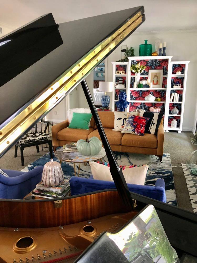 The view of the living room from the piano bench.