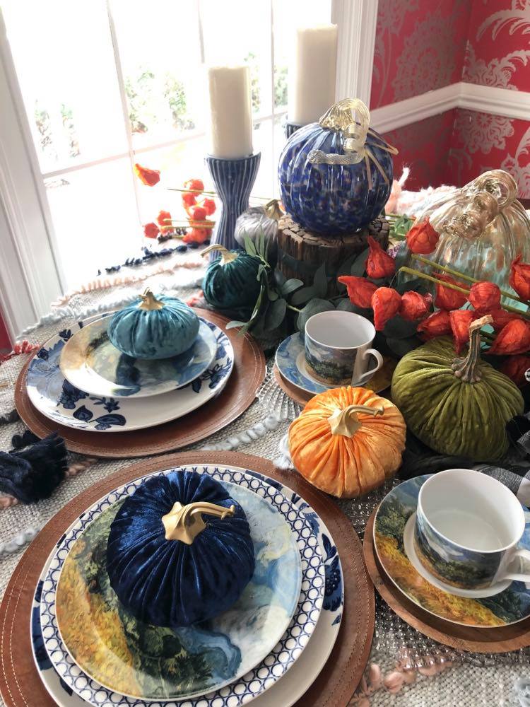 A colorful Thanksgiving table setting.