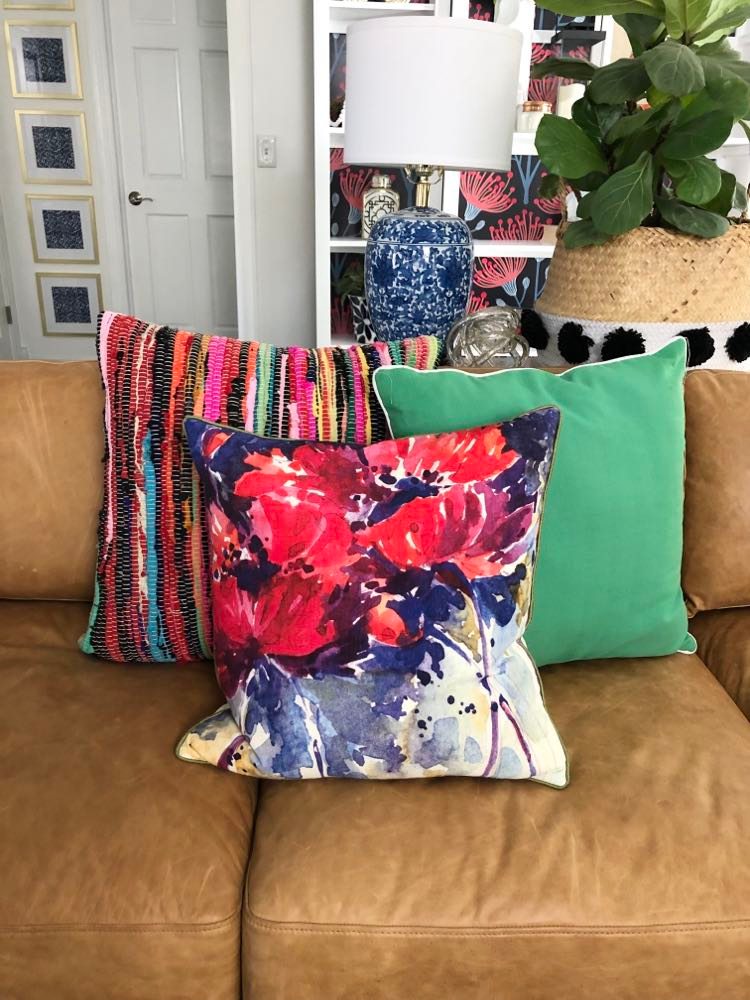Styling pillows in very bold colors for a sofa.