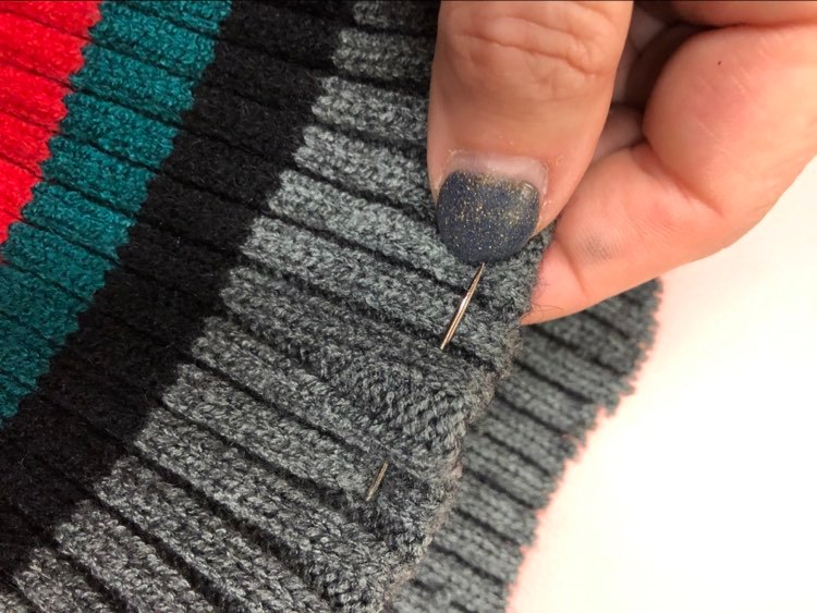 Using a basting stitch to create a rolled edge.