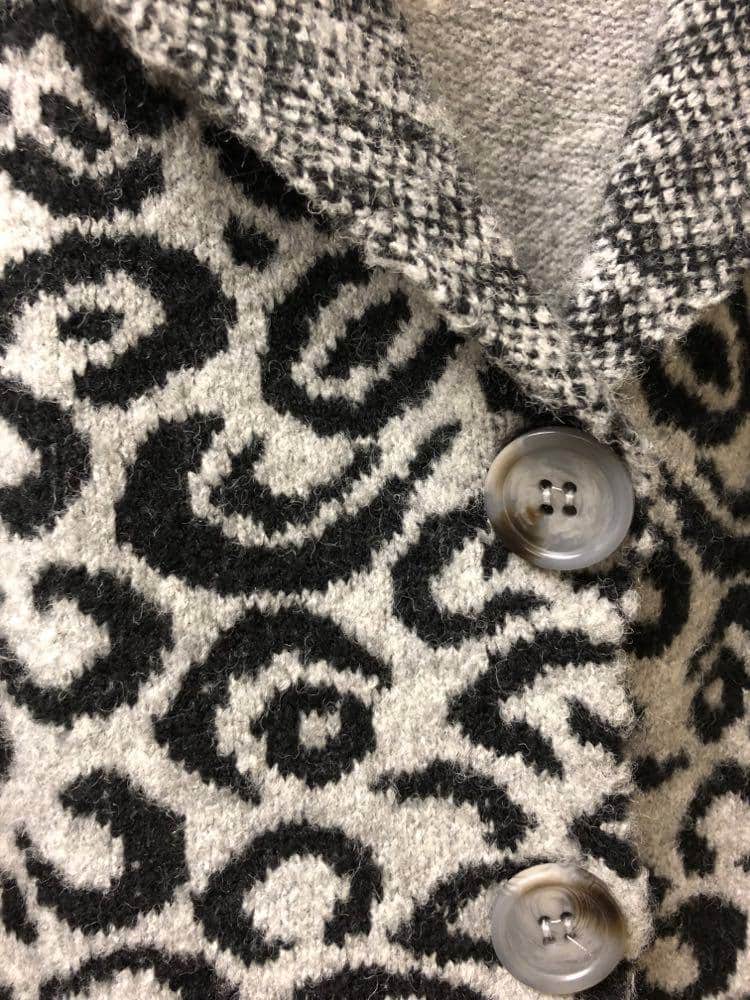 The remaining sweater fabric in an animal print.