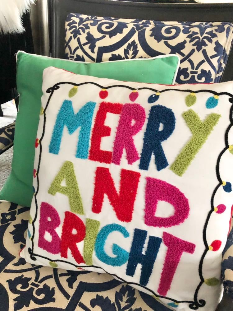 Pillow with text Merry and Bright