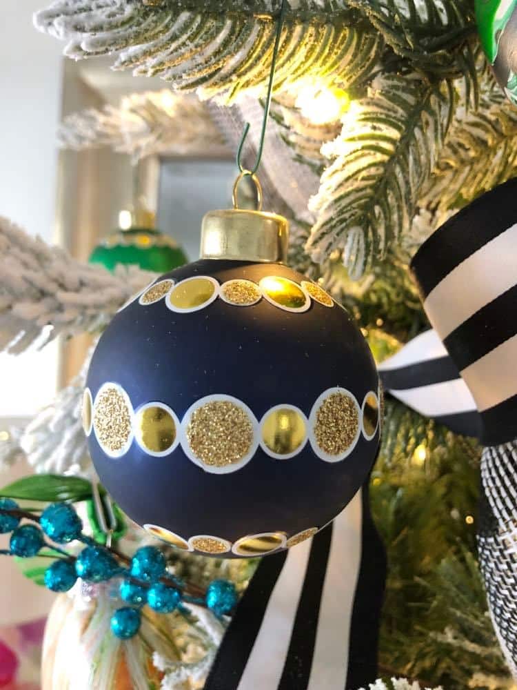 Blue ornament with gold dots.