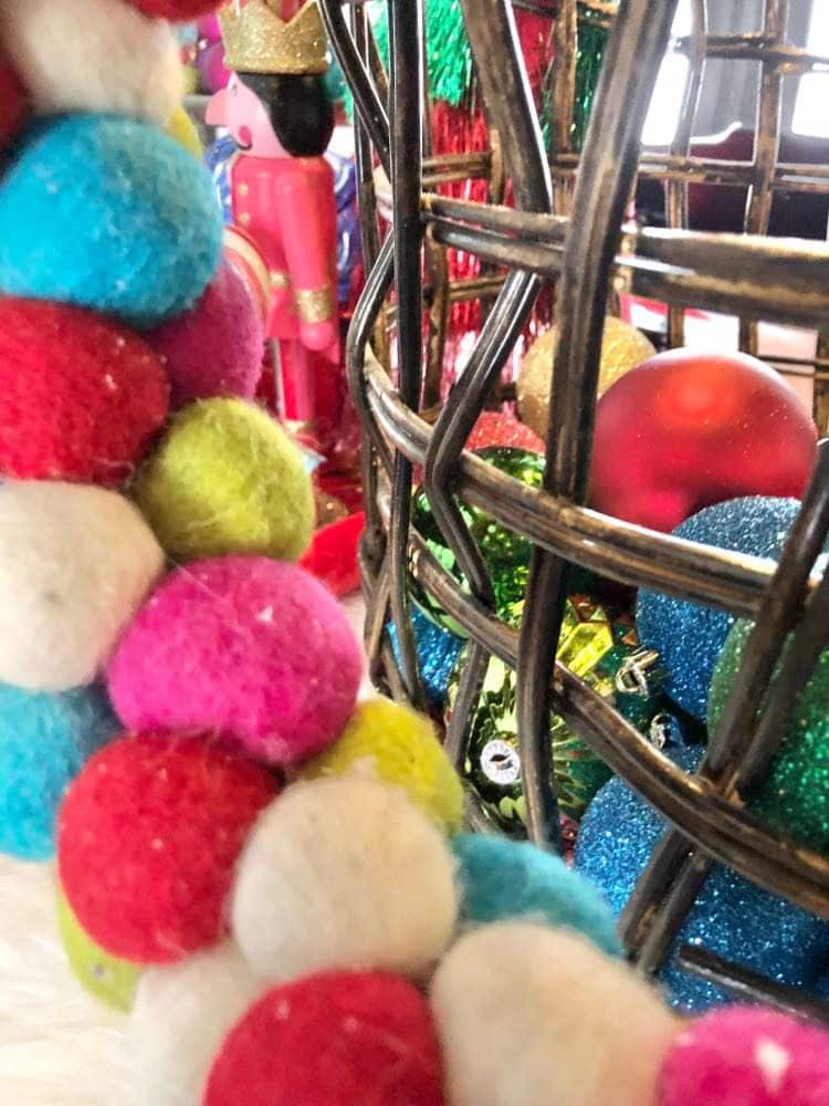 Ornaments in an open weave basket.