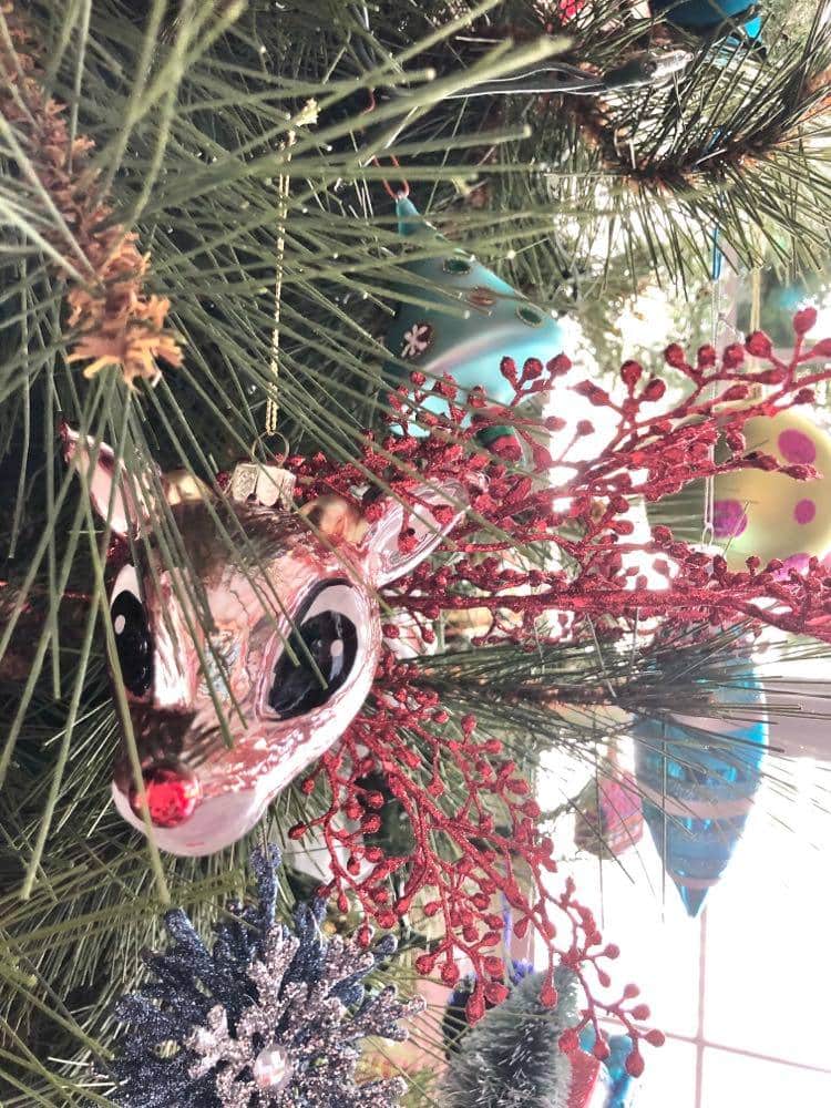 Rudolph ornament on the tree.