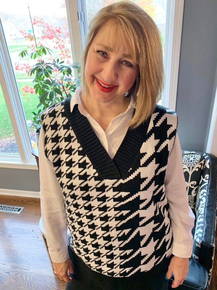 Black and white patterned sweater vest.