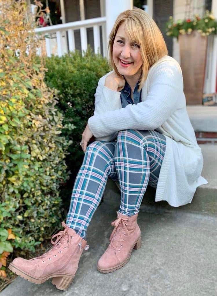 Plaid leggings and blush pink ankle boots.