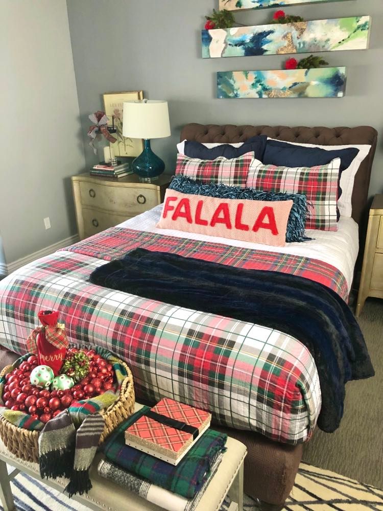 Red and white plaid tidings Christmas bedding.