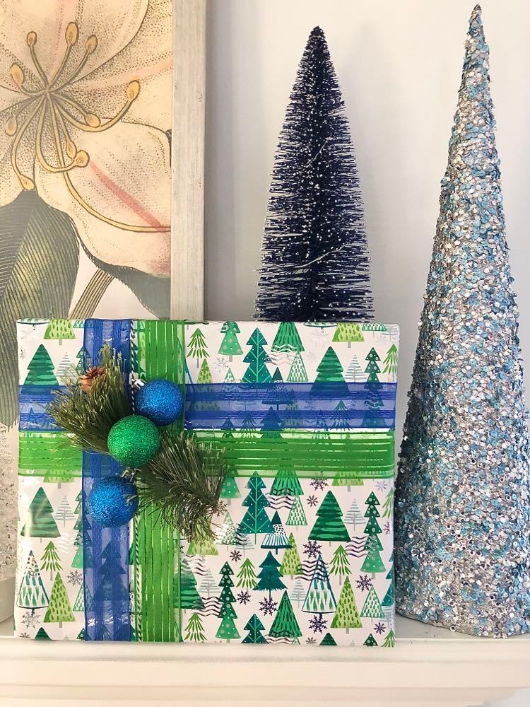 A colorful green and blue Christmas gift wrap idea.
