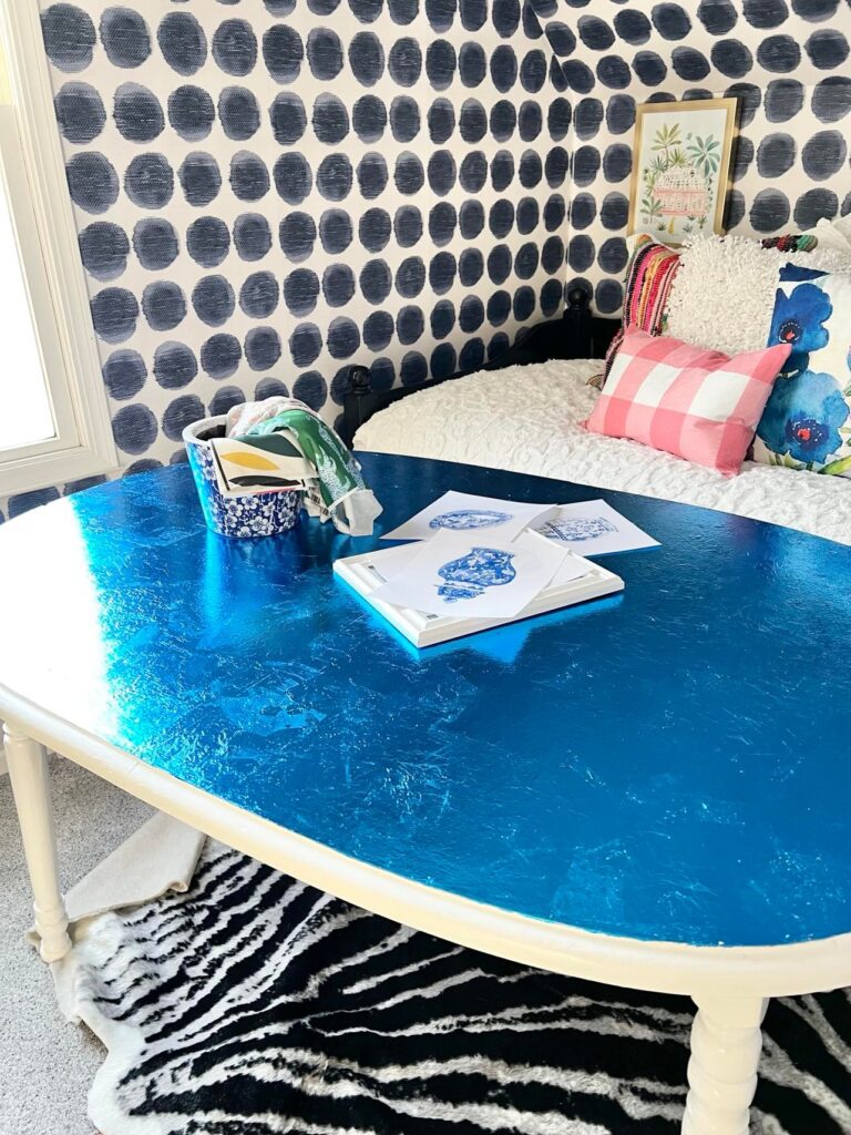 The completed foil leaf table sitting by the window.