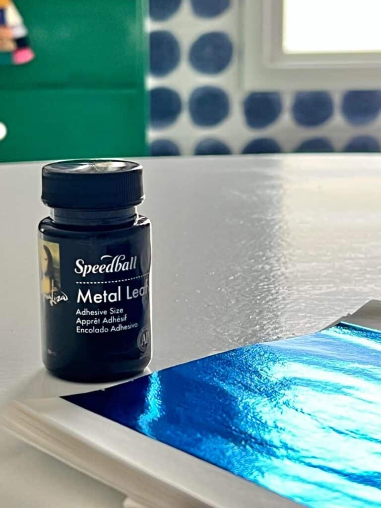 Blue leaf foil and metal leaf adhesive.