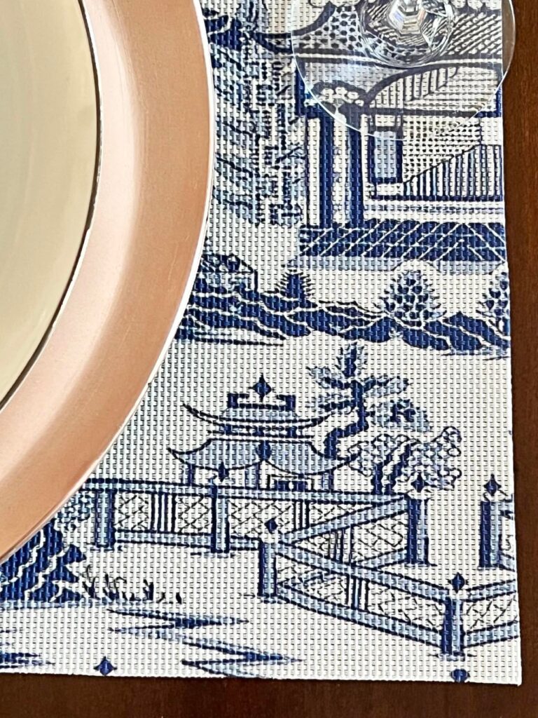 A blue and White chinoiserie placemat.