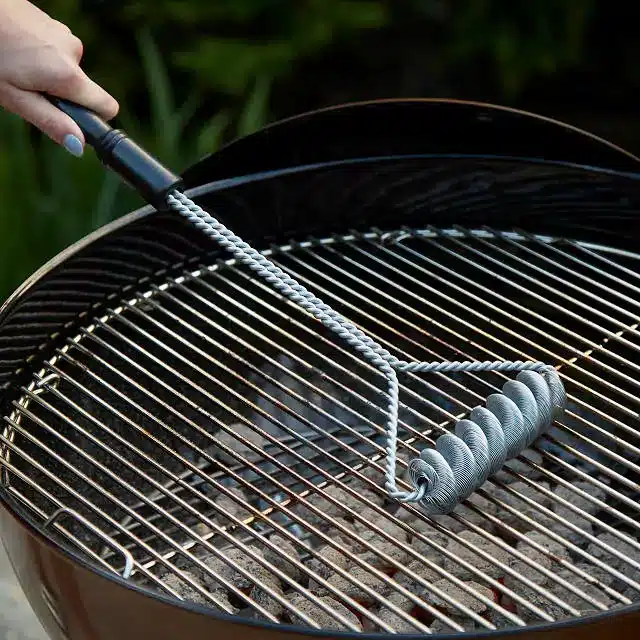 A grill brush with no bristles.