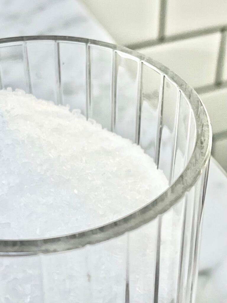 Epsom salt in a glass jar. 
Budget-friendly bathroom spa experience.