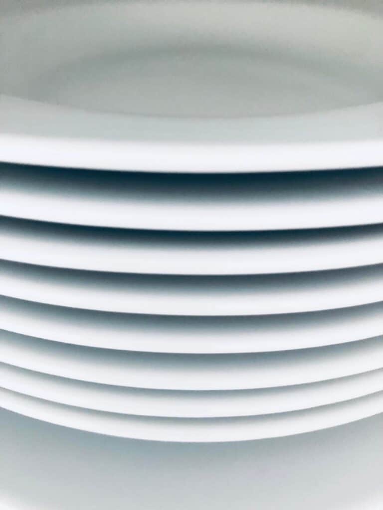 A stack of white pasta bowls.
