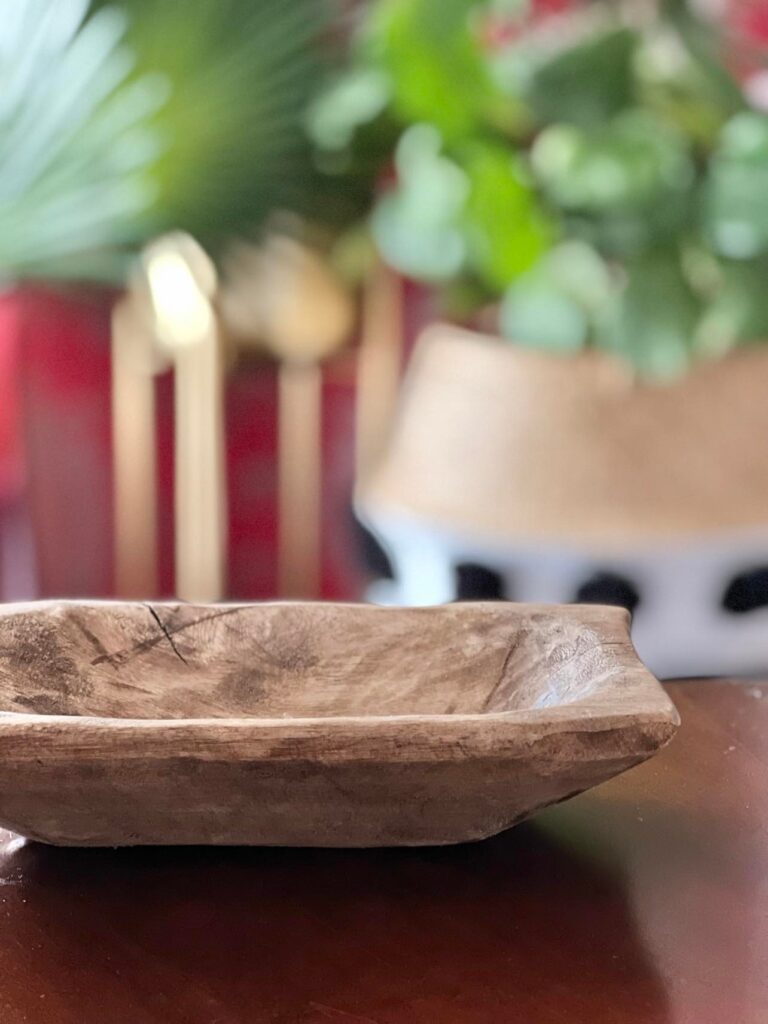 An empty dough bowl sitting on a table.