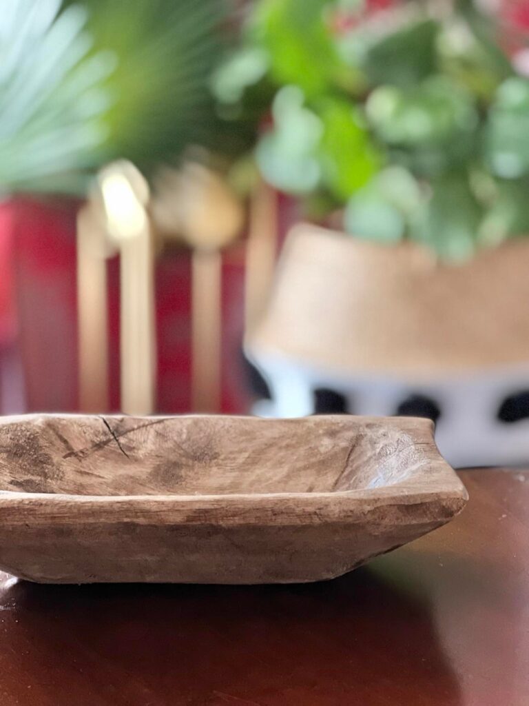An empty dough bowl sitting on a table reading for decorating.