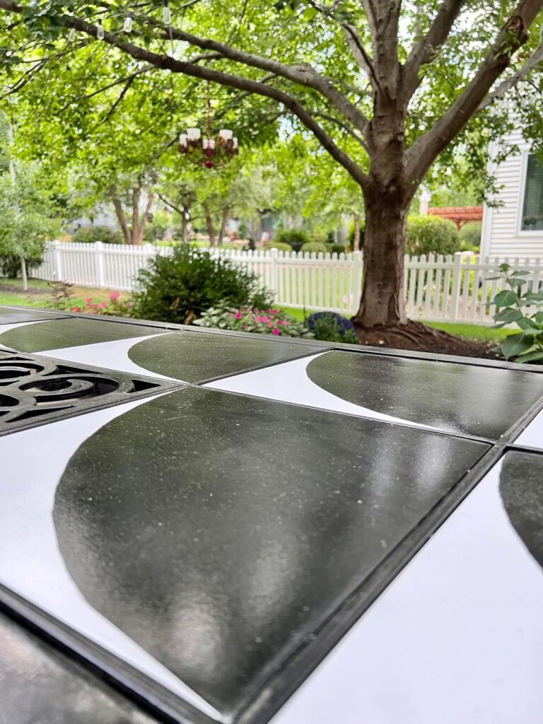 A side view of the patio table on the back patio.