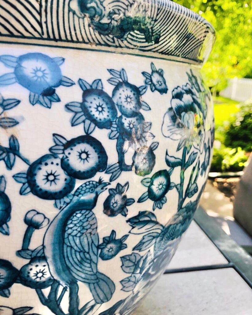 A blue and white chinoiserie planter pot.
