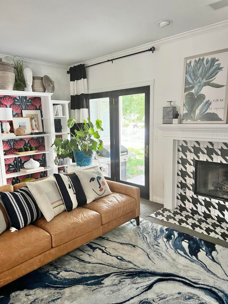 The Living Room corner with empty wall space above the black patio doors.