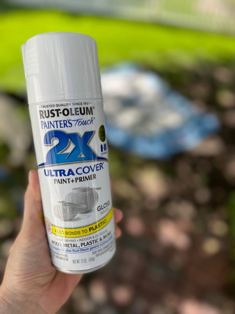 A can of white Rust-Oleum spray paint.