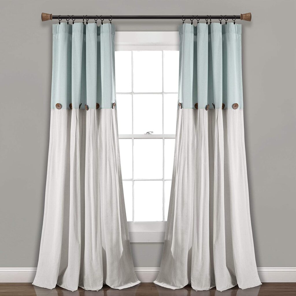 A two-tone curtain panel with button detail you can buy on Amazon.