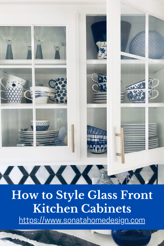 Blue nd white dinnerware behind glaass front cabinets in the kitchen.