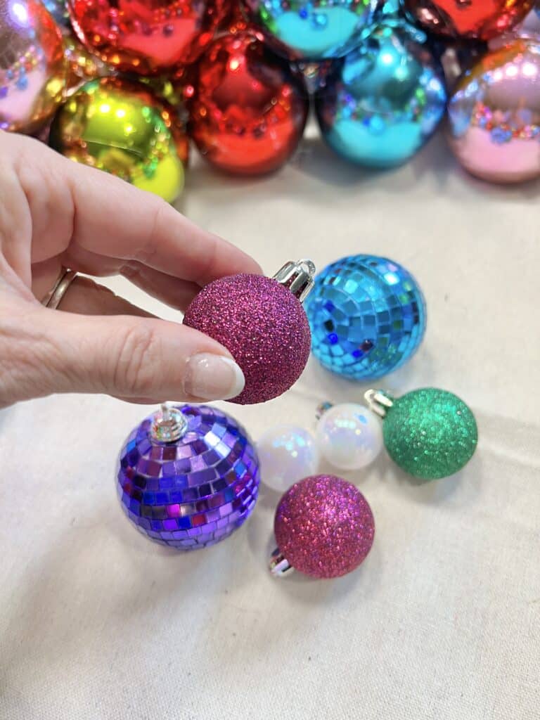 Small ornaments in different colors, sizes, and textures.