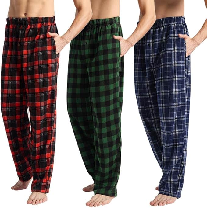Three pairs of mens lounge pants in red, green, and blue plaid patterns.