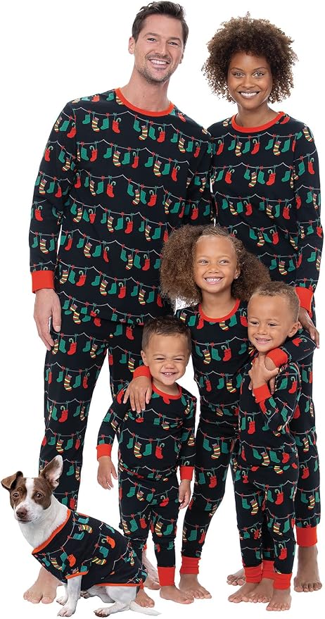 A family wearing Christmas pajamas with a light bulb strand pattern.