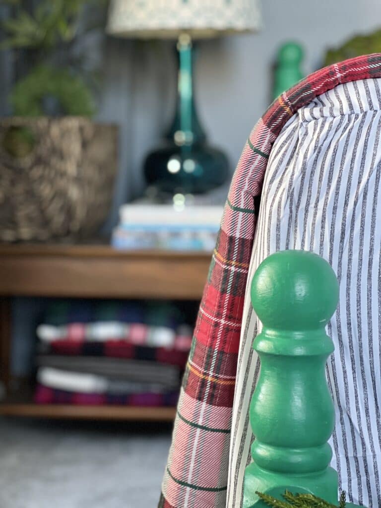 Colorful home decor. A wood bed frame that has been painted green.