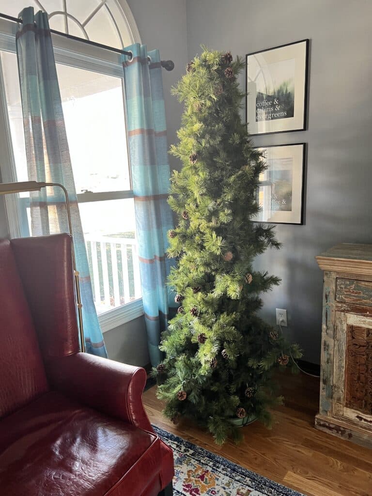 An old, thin, and worn out Christmas tree