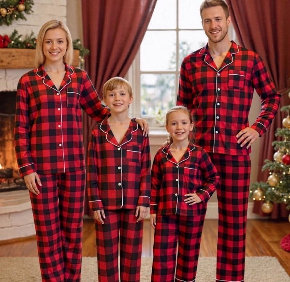 Family wearing red buffalo plaid Christmas pajamas.