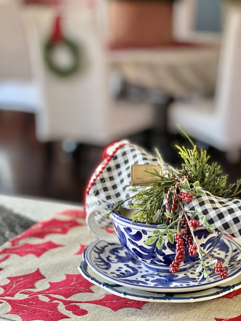 A soup bowl with decorated napkin inside.