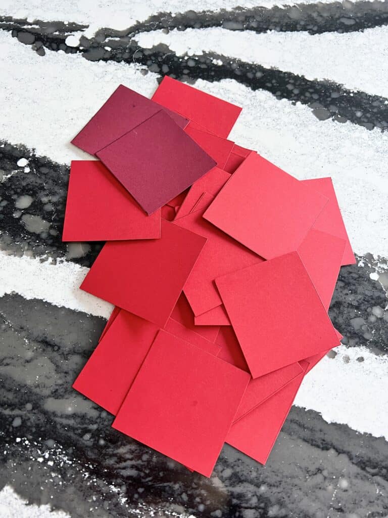 3" x 3" squares of red cardstock.