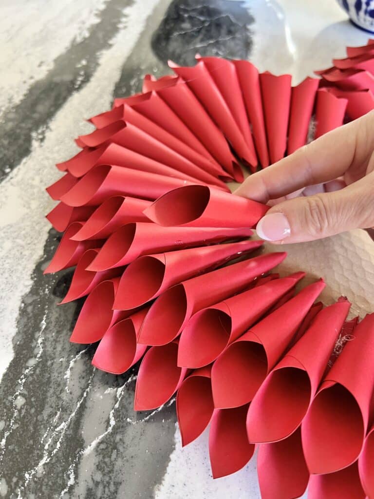 Adding layers of paper cones to the DIY heart.