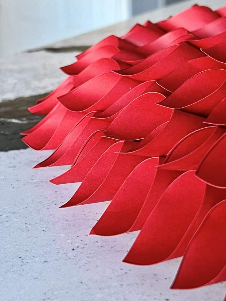The outer edges of the DIY paper cone Valentine heart.
