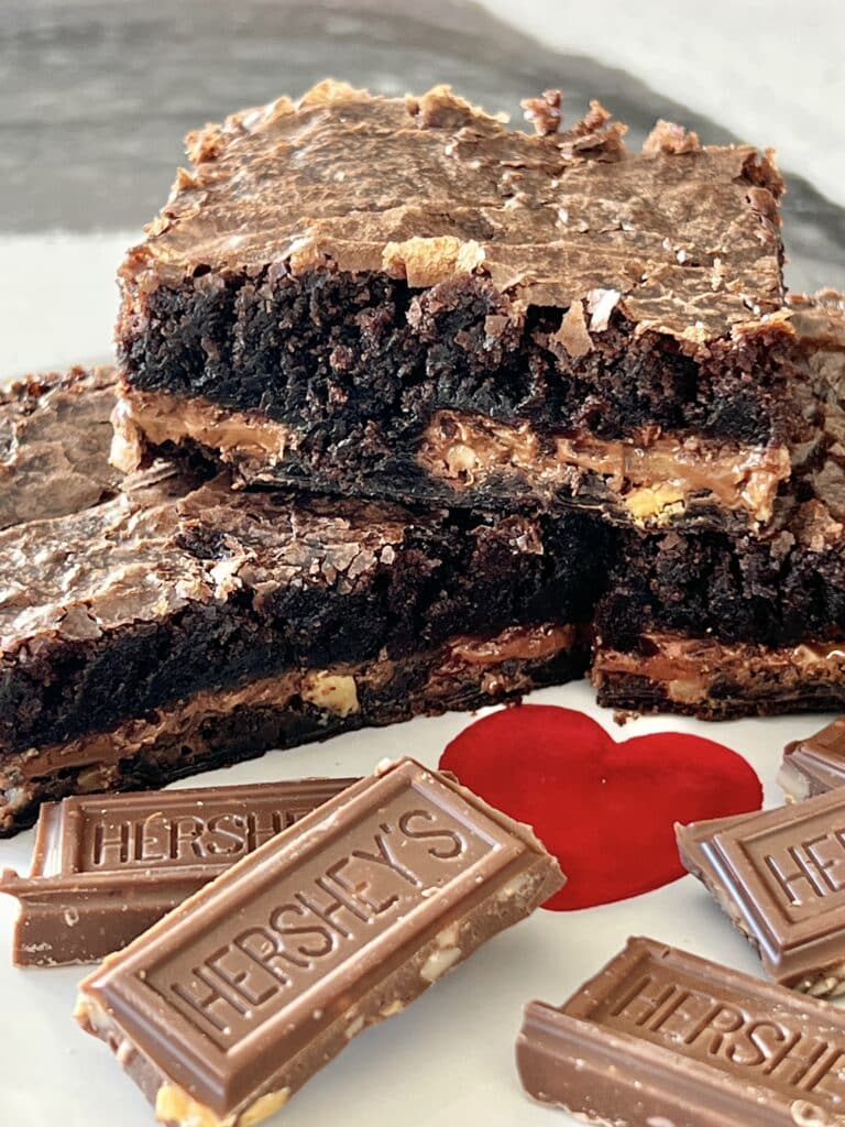 Chocolate Symphony Brownies on a white plate with a red heart.