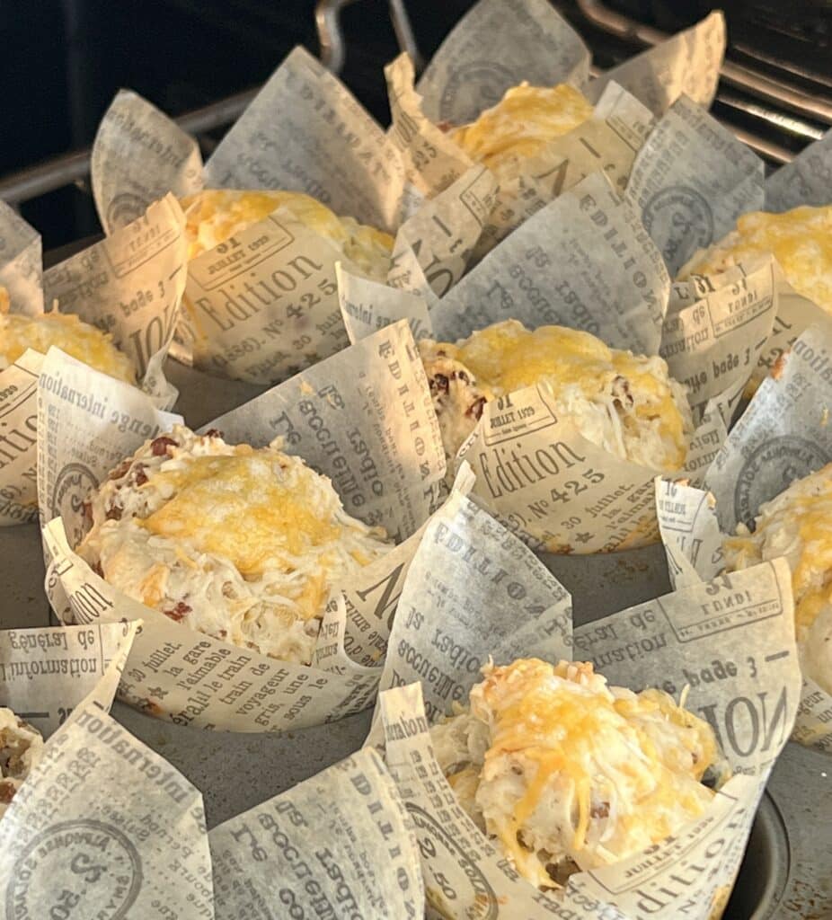 Baked muffins in paper baking cups.