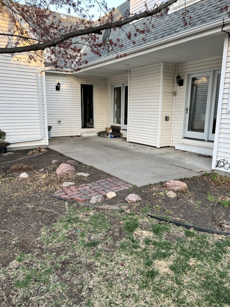 An empty patio waiting to be demolished.