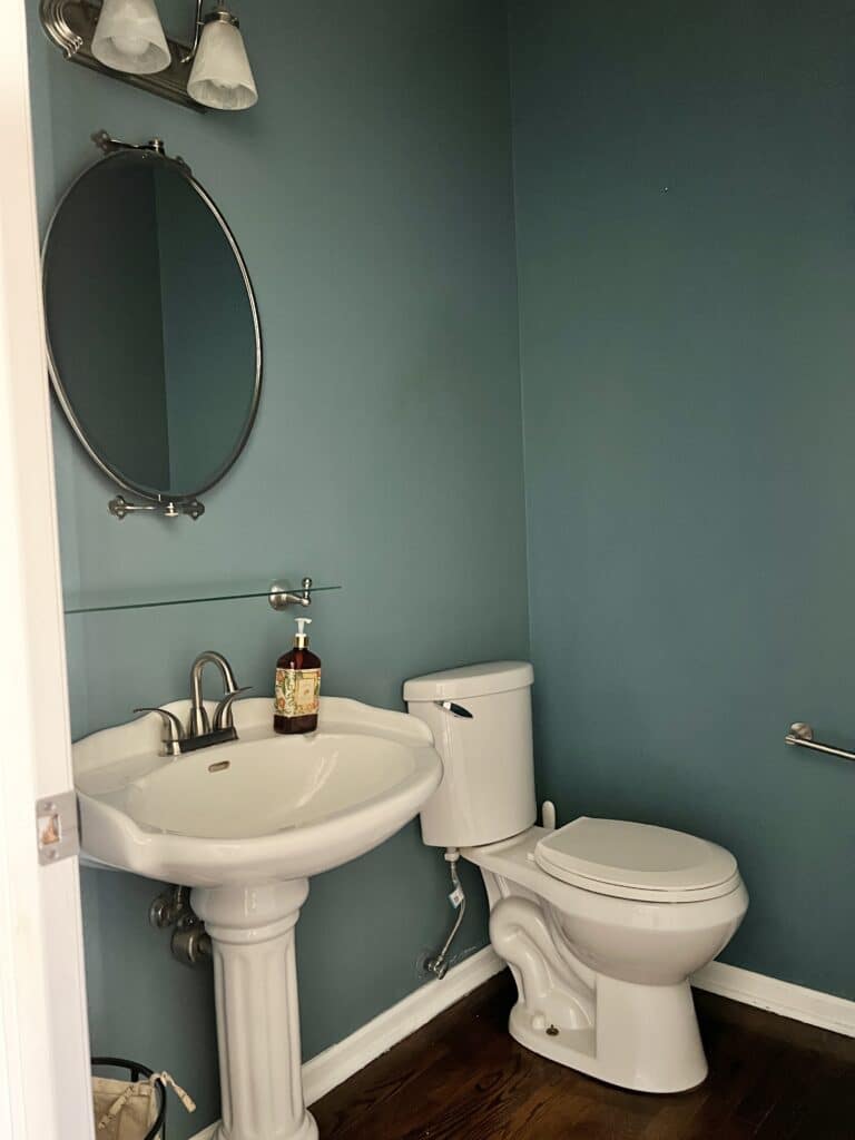 Half Bath makeover - the dark blue walls and tiny square footage are some of the challenges for this One Room Challenge.