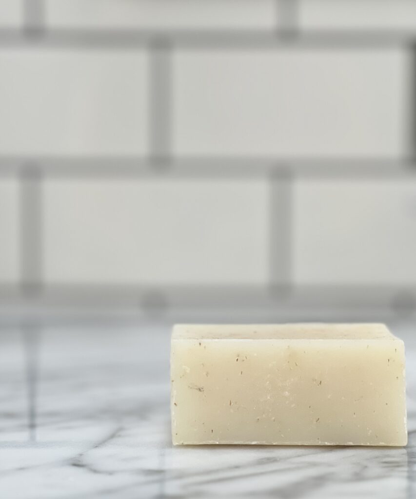 Half bath makeover - a bar of natural soap sits on top of a bathroom vanity.