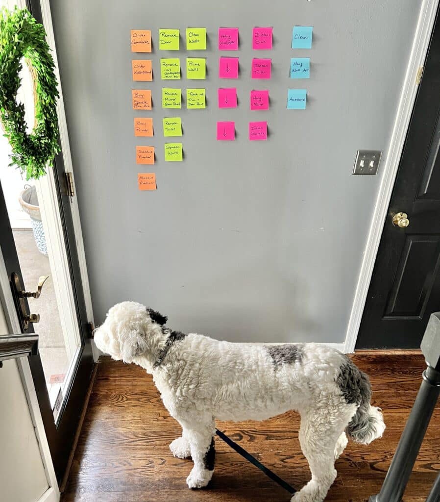 View of the sticky notes on the wall from the stairs.