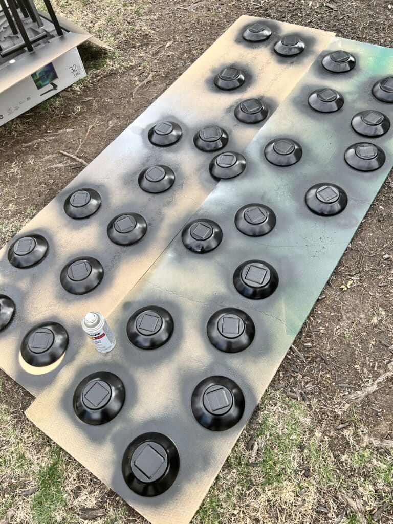 Spray painting the caps.