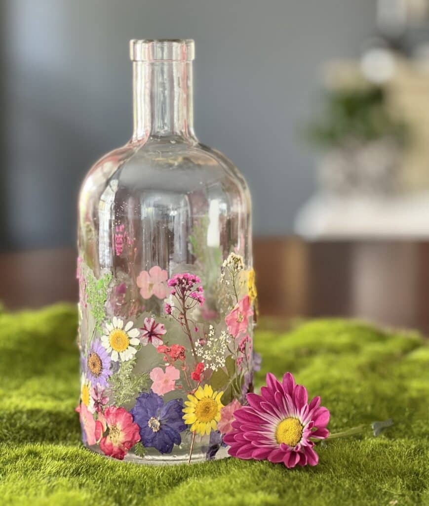 A floral vase displayed as decor on a kitchen table.