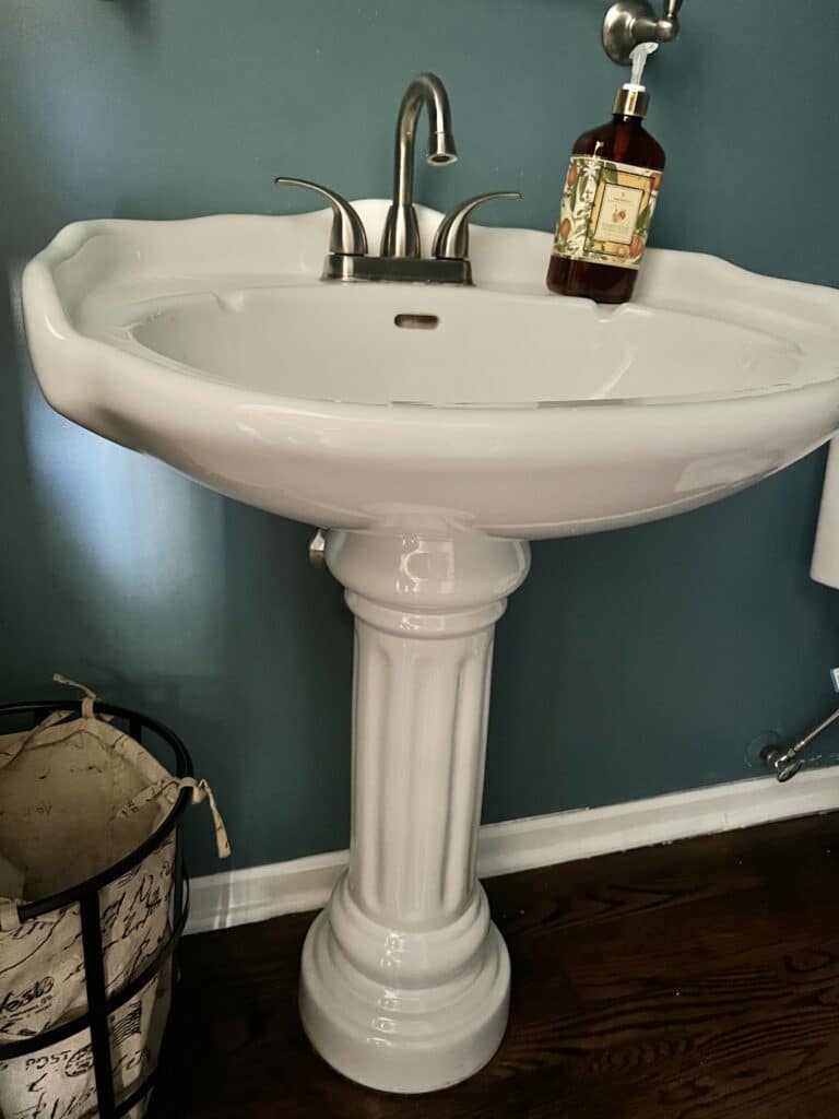 A white pedestal sink.